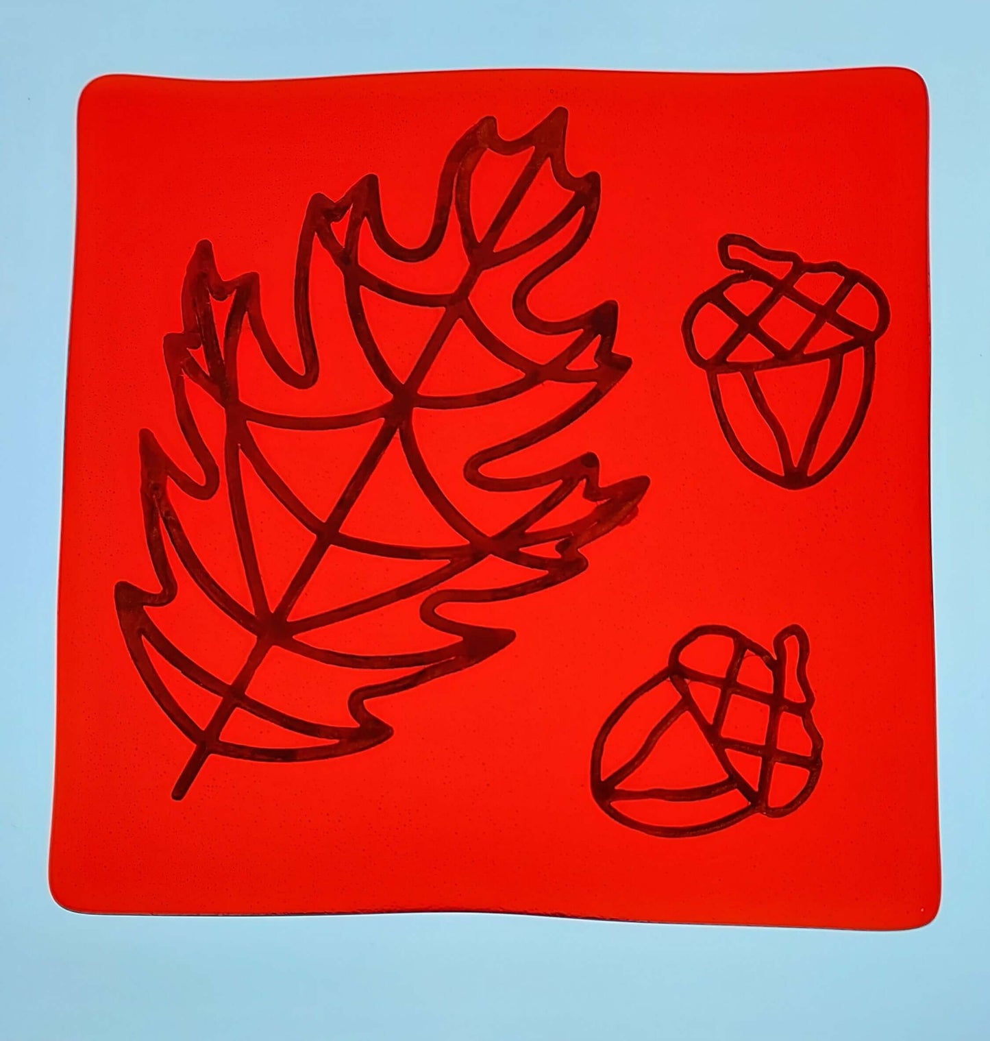 Orange plate with light behind