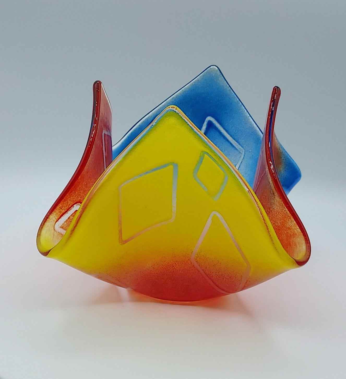 Primary colors glass vase with floating diamond pattern