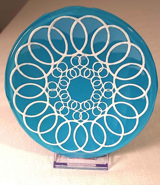Blue 6" glass plate with ringlet design