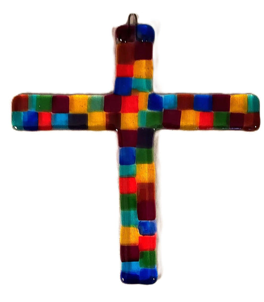 A multicolored mosaic glass cross with a variety of colors including blue, red, yellow, and green.