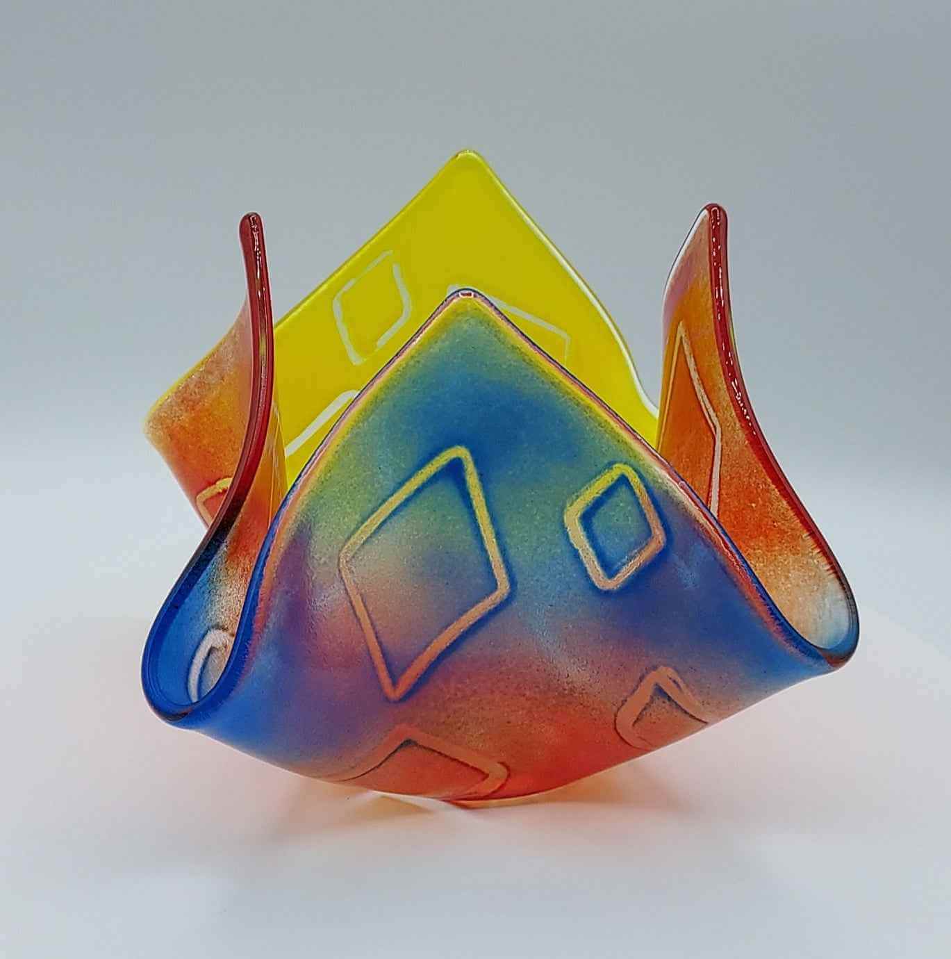 Primary colors glass vase with floating diamond pattern