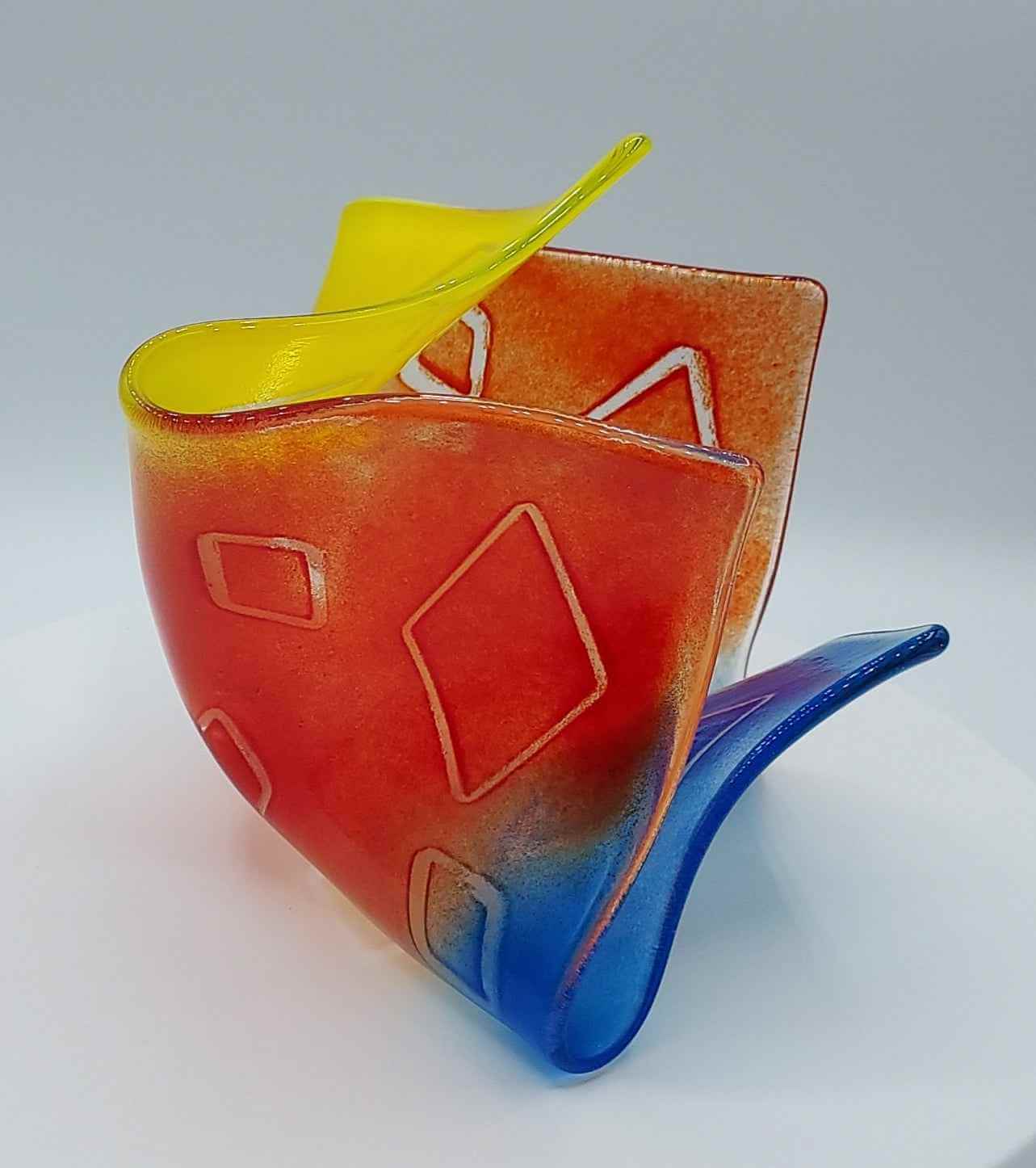 Primary colors glass vase with floating diamond pattern